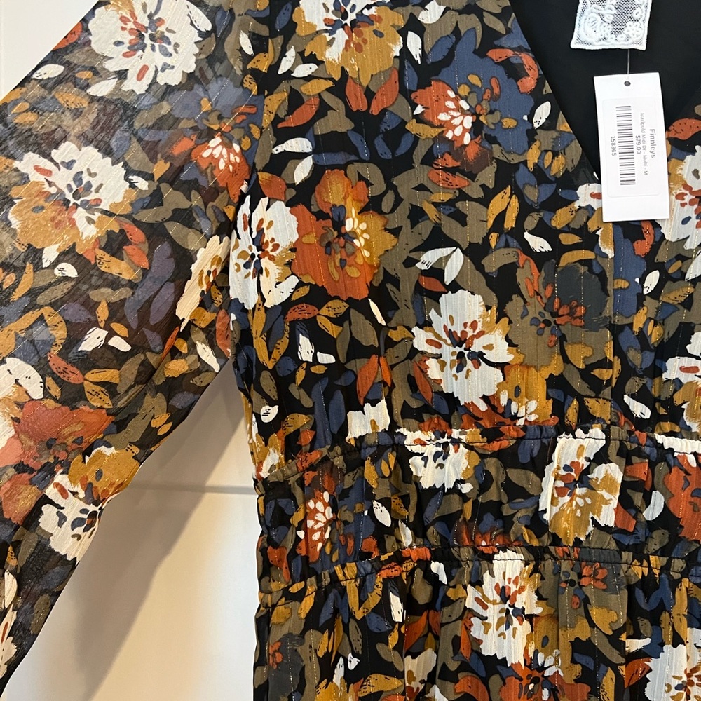 Brand new Finnleys size medium multicolored midi dress